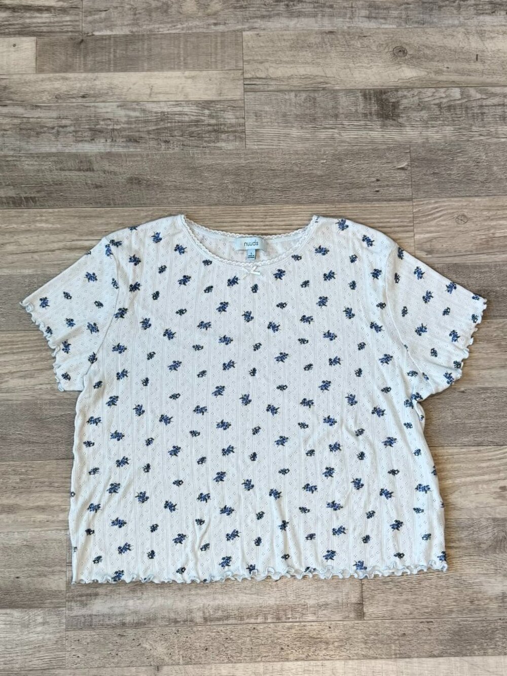 Nuuds blue floral stretchy knit crop top short sleeve ruffle hem size large N46